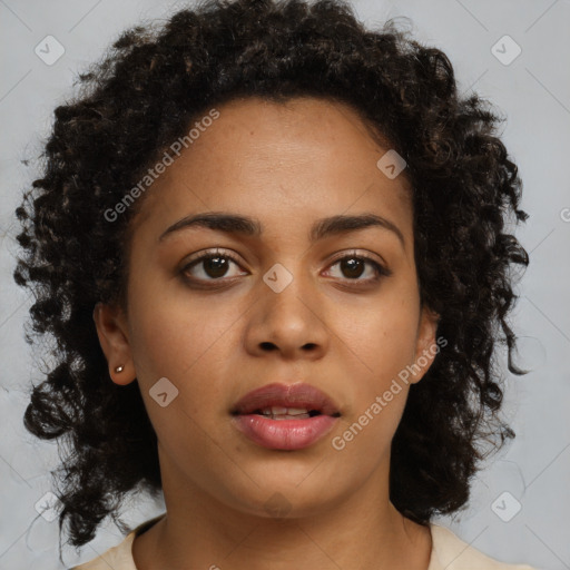 Neutral black young-adult female with medium  brown hair and brown eyes