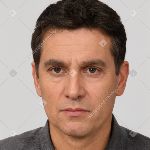 Neutral white adult male with short  brown hair and brown eyes