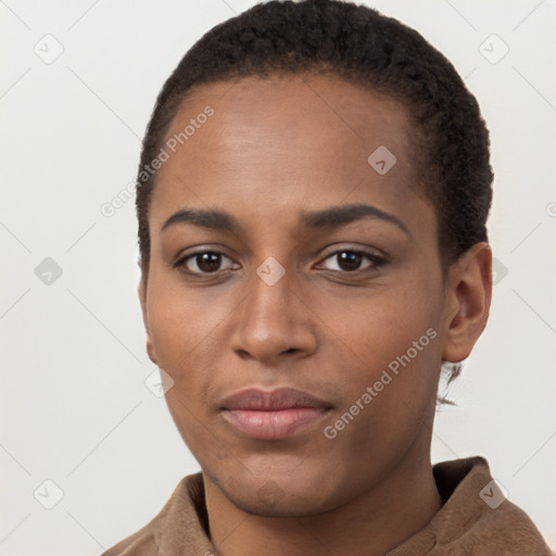 Joyful black young-adult female with short  brown hair and brown eyes