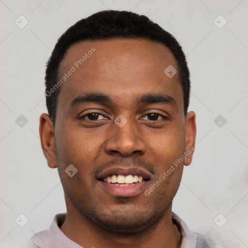Joyful black young-adult male with short  black hair and brown eyes