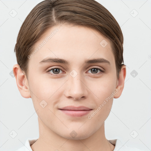 Joyful white young-adult female with short  brown hair and grey eyes