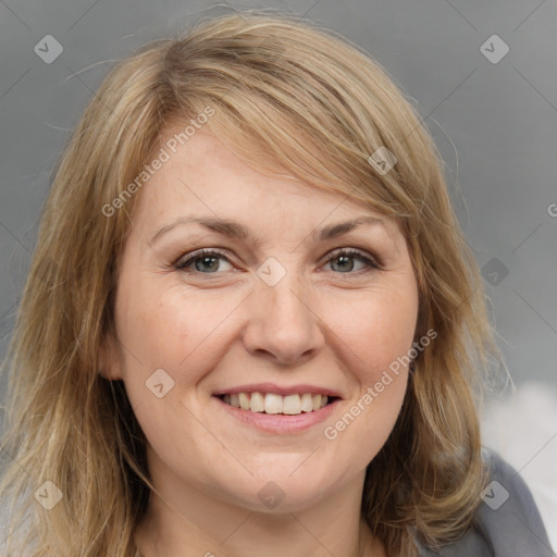 Joyful white young-adult female with medium  brown hair and blue eyes