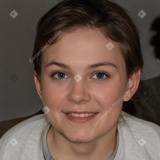 Joyful white young-adult female with medium  brown hair and blue eyes