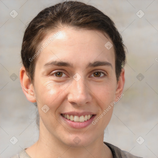 Joyful white young-adult female with short  brown hair and brown eyes