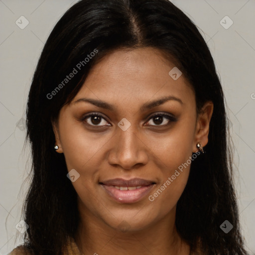 Joyful black young-adult female with long  brown hair and brown eyes