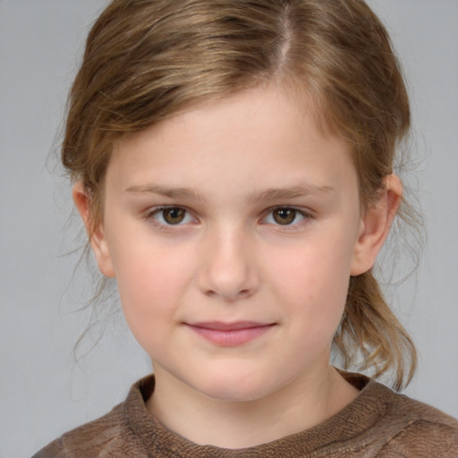 Joyful white child female with medium  brown hair and grey eyes