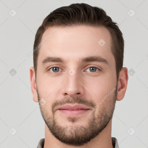 Neutral white young-adult male with short  brown hair and grey eyes