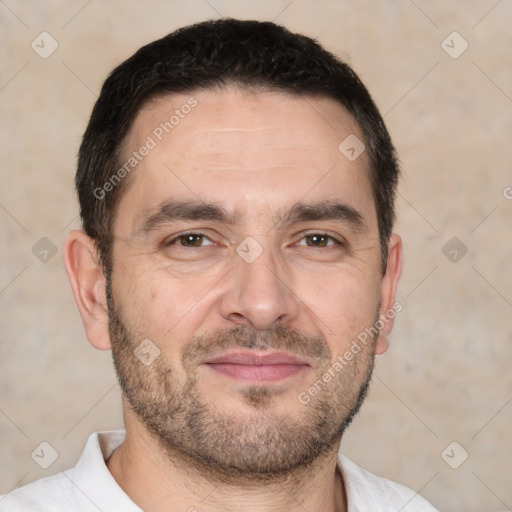 Joyful white adult male with short  brown hair and brown eyes