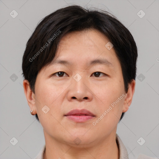 Neutral asian adult male with short  brown hair and brown eyes