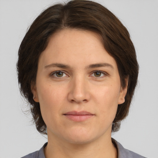 Neutral white adult female with medium  brown hair and brown eyes