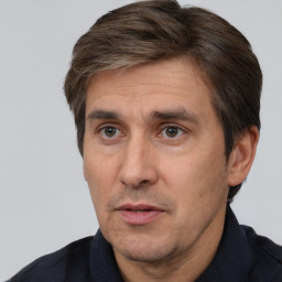 Neutral white adult male with short  brown hair and brown eyes