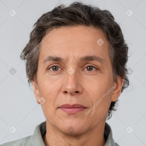 Joyful white middle-aged male with short  brown hair and brown eyes