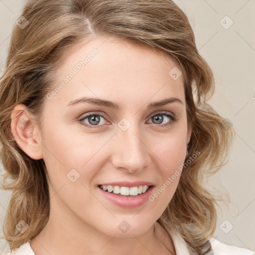 Joyful white young-adult female with medium  brown hair and blue eyes