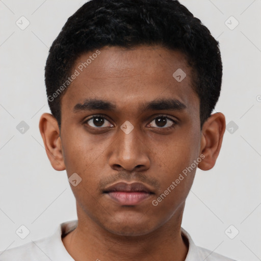 Neutral latino young-adult male with short  black hair and brown eyes
