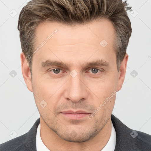 Neutral white adult male with short  brown hair and brown eyes