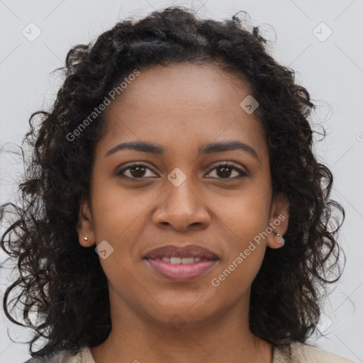 Joyful black young-adult female with long  brown hair and brown eyes