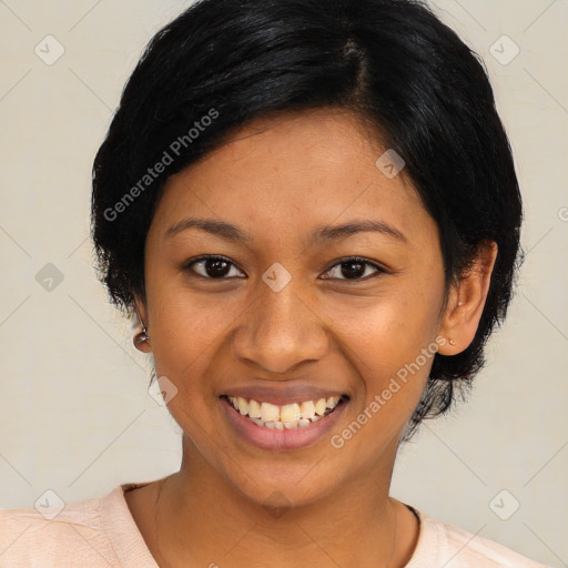 Joyful latino young-adult female with medium  black hair and brown eyes