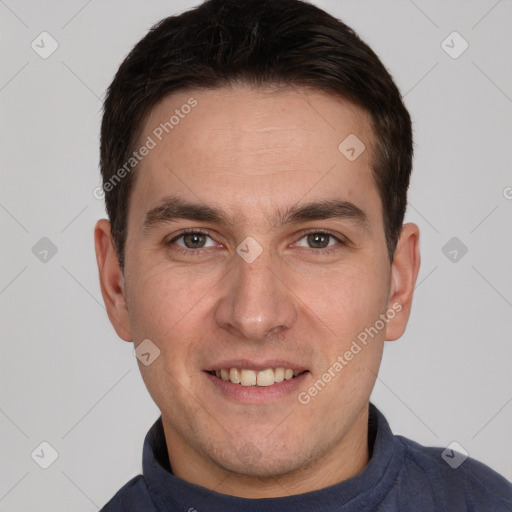 Joyful white young-adult male with short  brown hair and brown eyes