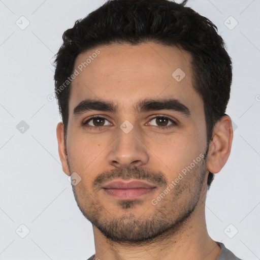 Neutral latino young-adult male with short  black hair and brown eyes