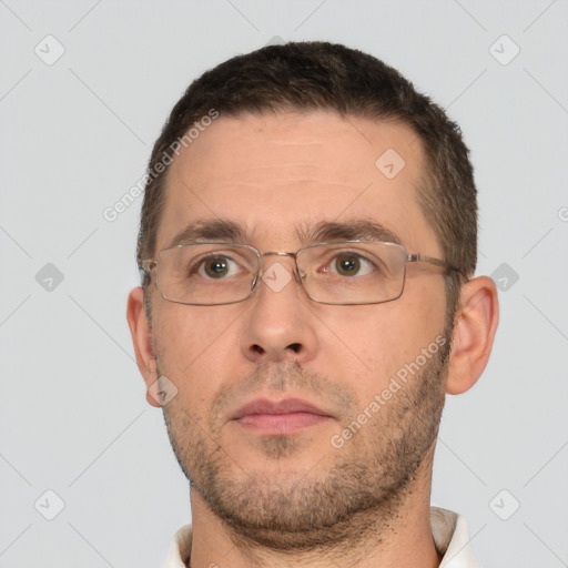 Neutral white adult male with short  brown hair and brown eyes