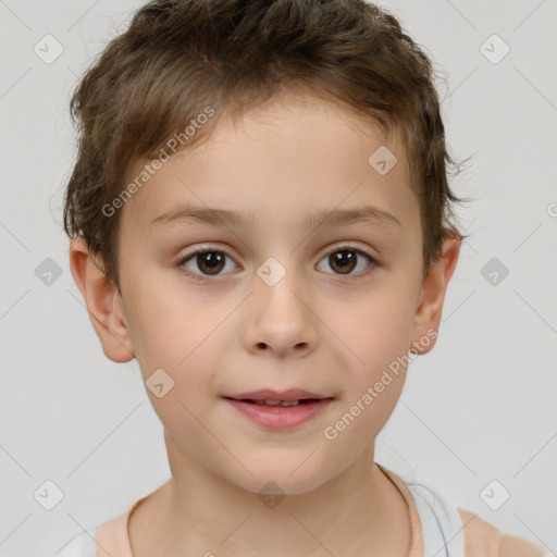 Joyful white child male with short  brown hair and brown eyes