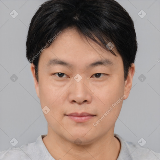 Neutral asian young-adult male with short  brown hair and brown eyes