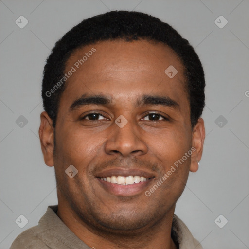 Joyful latino young-adult male with short  brown hair and brown eyes