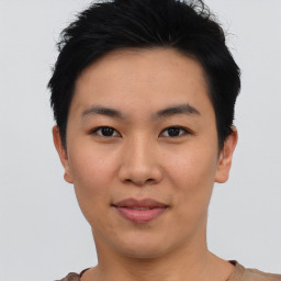 Joyful asian young-adult female with short  black hair and brown eyes