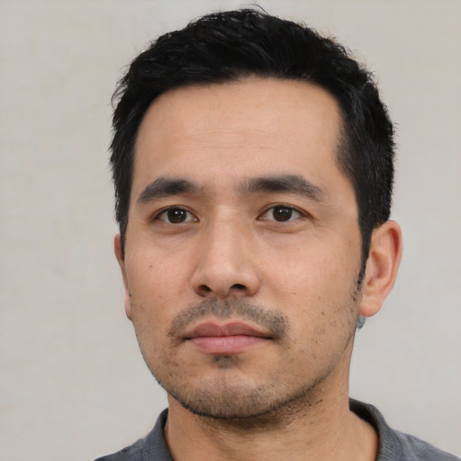 Neutral asian young-adult male with short  black hair and brown eyes