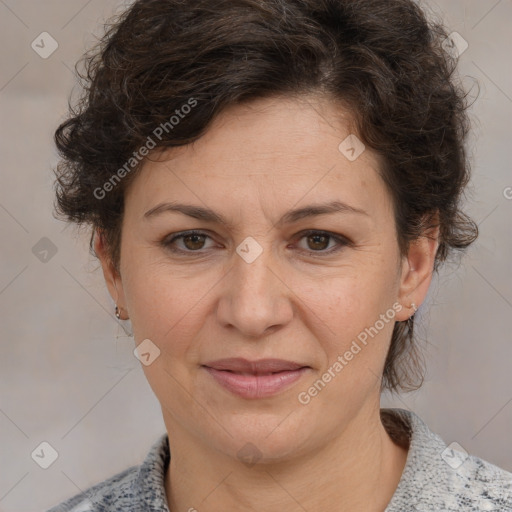 Joyful white adult female with medium  brown hair and blue eyes