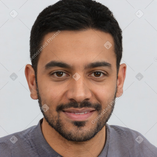 Joyful latino young-adult male with short  black hair and brown eyes