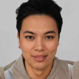 Joyful asian young-adult female with short  black hair and brown eyes