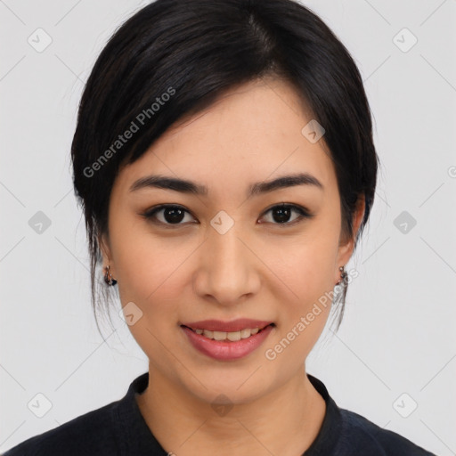 Joyful asian young-adult female with medium  black hair and brown eyes