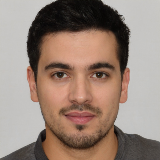 Neutral white young-adult male with short  black hair and brown eyes