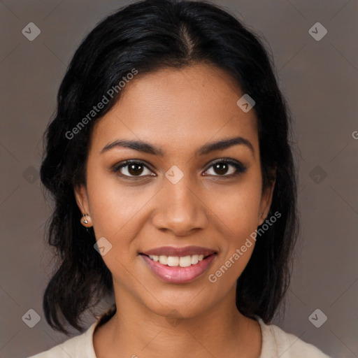 Joyful latino young-adult female with medium  black hair and brown eyes