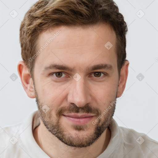 Joyful white young-adult male with short  brown hair and brown eyes