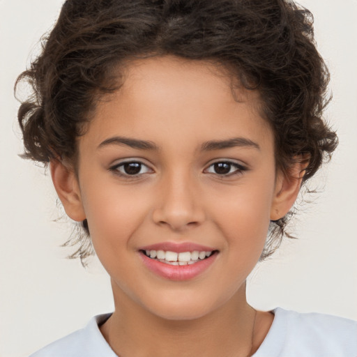 Joyful white child female with short  brown hair and brown eyes