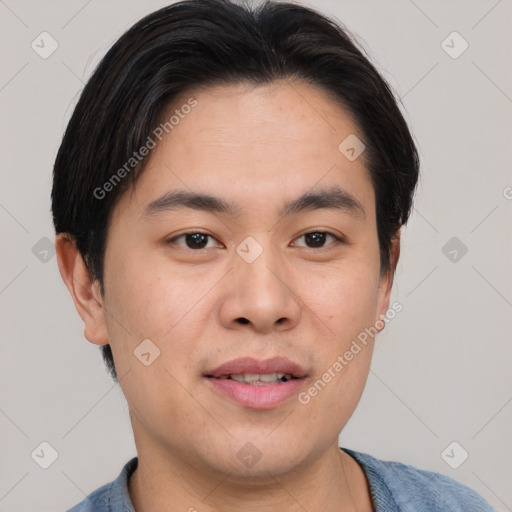 Joyful asian young-adult male with short  brown hair and brown eyes