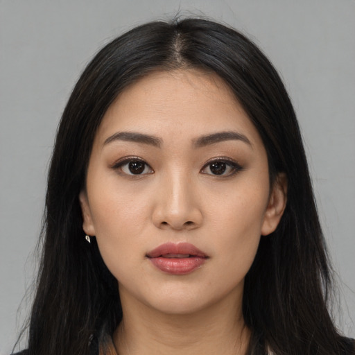 Neutral asian young-adult female with long  brown hair and brown eyes