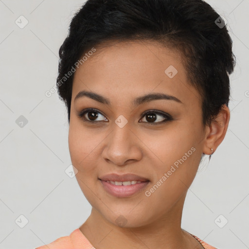 Joyful latino young-adult female with short  brown hair and brown eyes