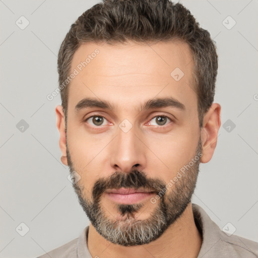 Neutral white young-adult male with short  brown hair and brown eyes