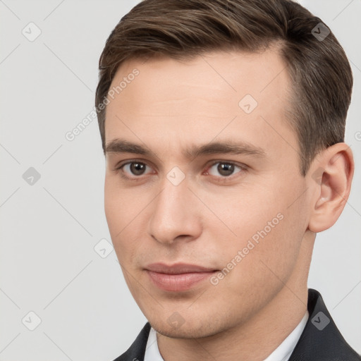 Neutral white young-adult male with short  brown hair and brown eyes