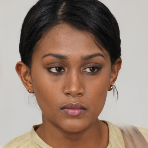 Neutral asian young-adult female with short  brown hair and brown eyes