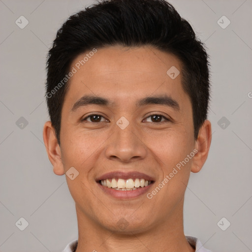 Joyful white young-adult male with short  black hair and brown eyes