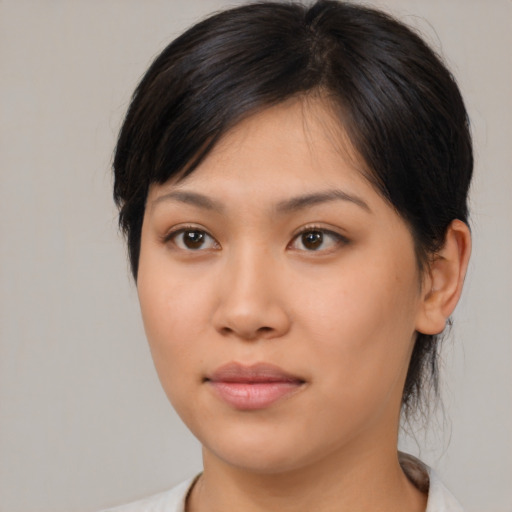 Neutral asian young-adult female with medium  brown hair and brown eyes