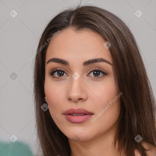 Neutral white young-adult female with long  brown hair and brown eyes