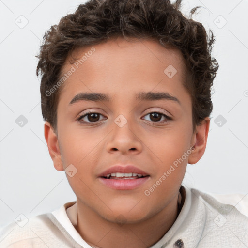 Joyful white child male with short  brown hair and brown eyes