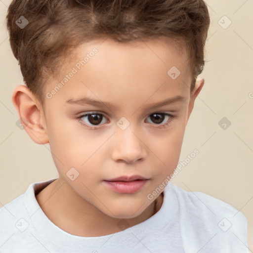 Joyful white child male with short  brown hair and brown eyes