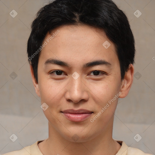 Joyful asian young-adult male with short  brown hair and brown eyes