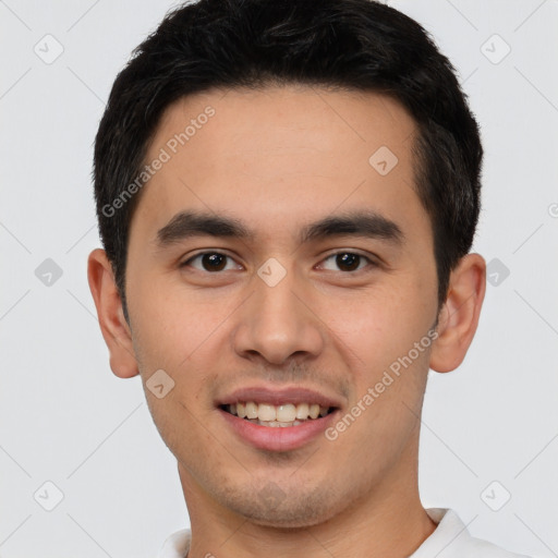 Joyful white young-adult male with short  black hair and brown eyes